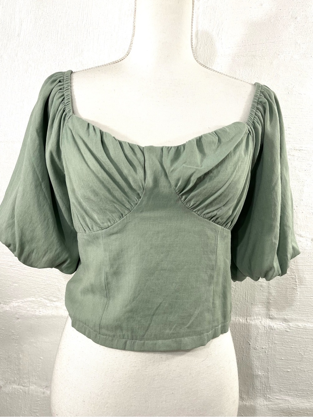 AND NOW THIS CROPPED OFF THE SHOULDER TOP